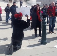Woman on knees praying at SCOTUS steps because Melanie told her that her daughters have two moms. Photo: Cathy Kristofferson,   Oblogdeeoblogda©