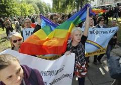 Gay rights activists take part in a march across Kiev May 25, 2013. REUTERS/Gleb Garanich